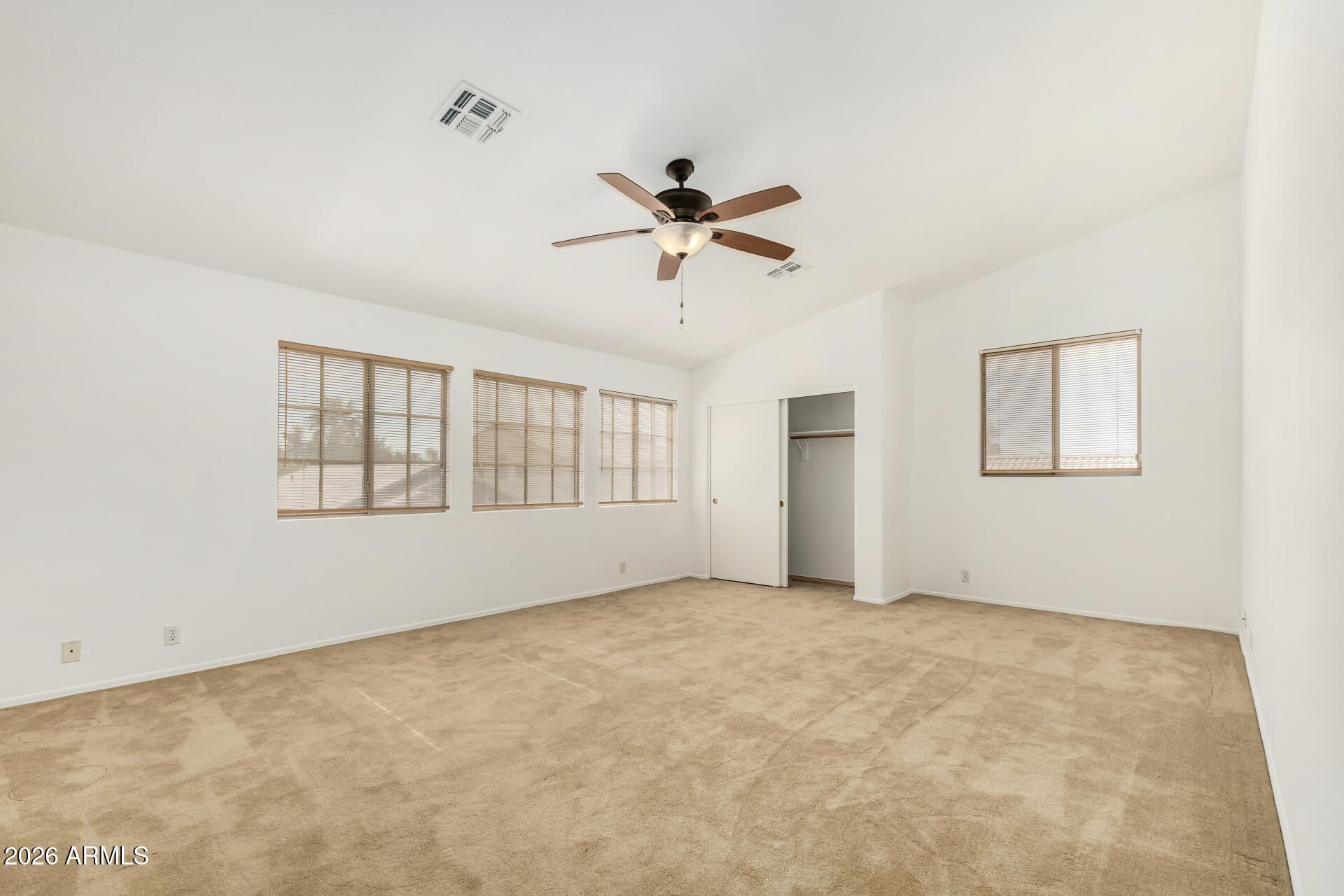 3962 East Agave Road Phoenix, AZ 85044 - Photo 16 of 54 a view of an empty room with a window