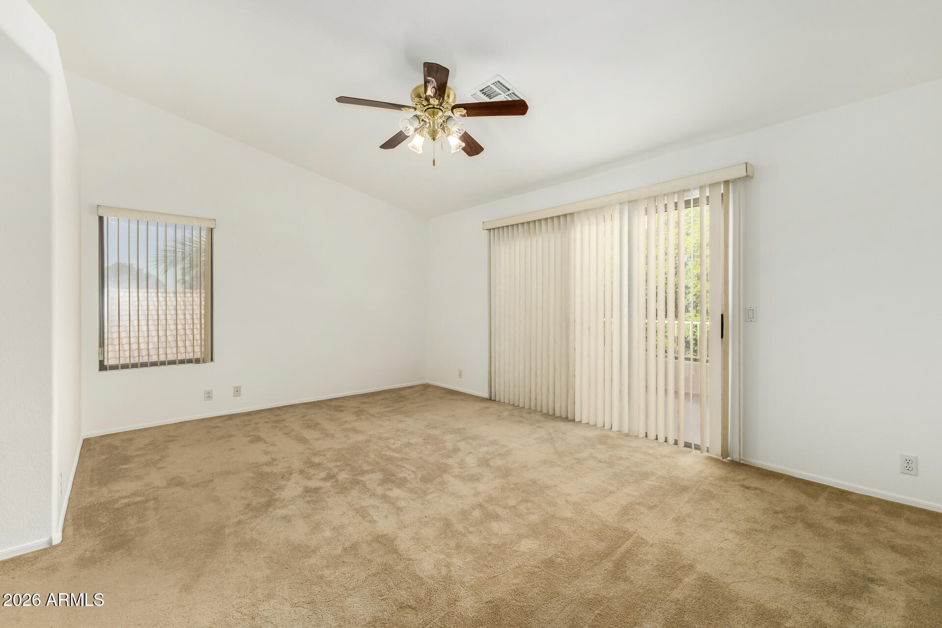 3962 East Agave Road Phoenix, AZ 85044 - Photo 18 of 54 a view of an empty room with a window