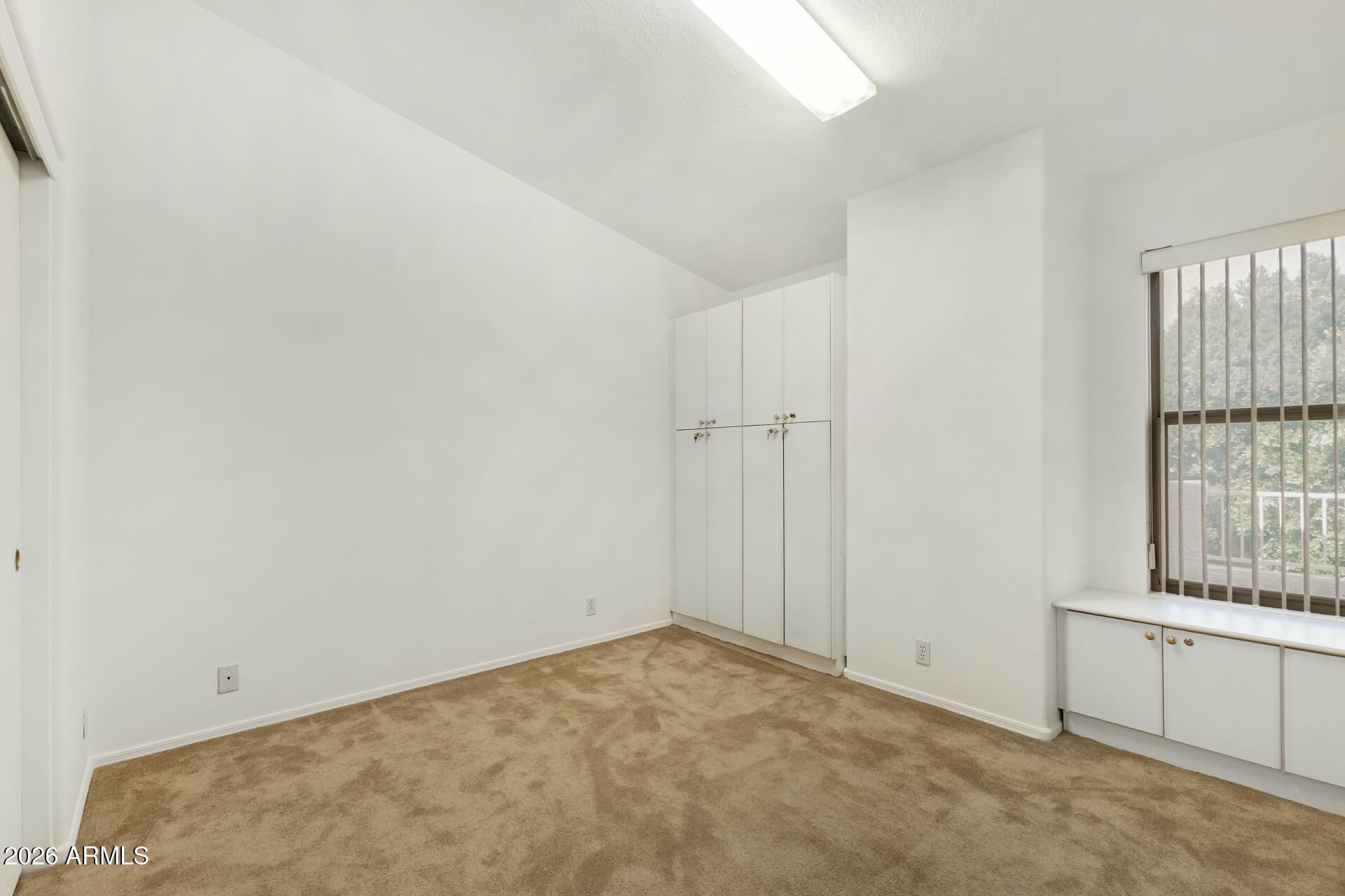 3962 East Agave Road Phoenix, AZ 85044 - Photo 23 of 54 a view of an empty room and window