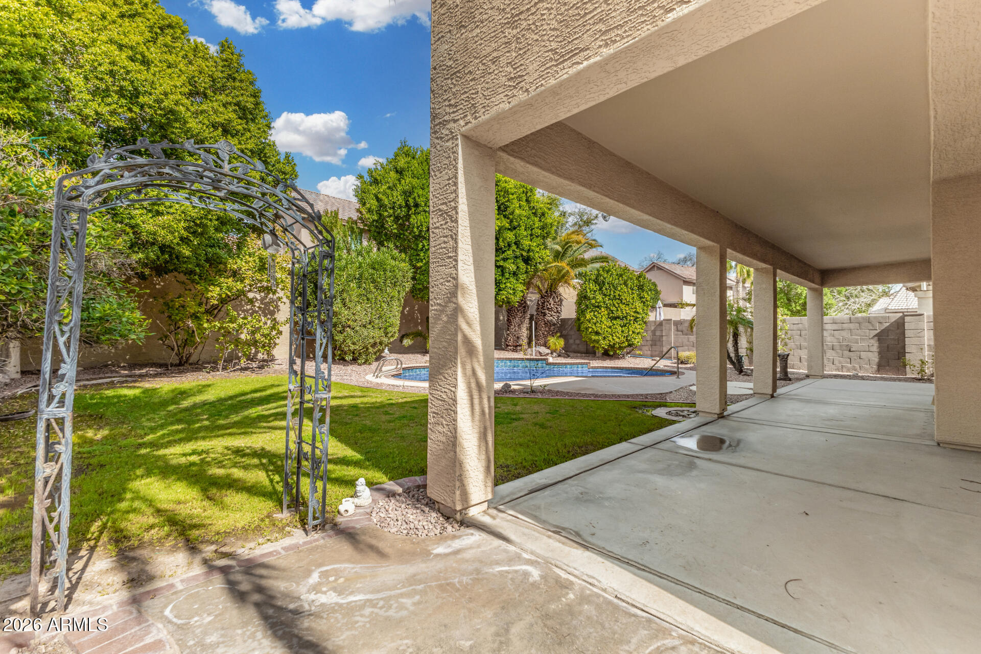 3962 East Agave Road Phoenix, AZ 85044 - Photo 38 of 54 a view of a porch and garden