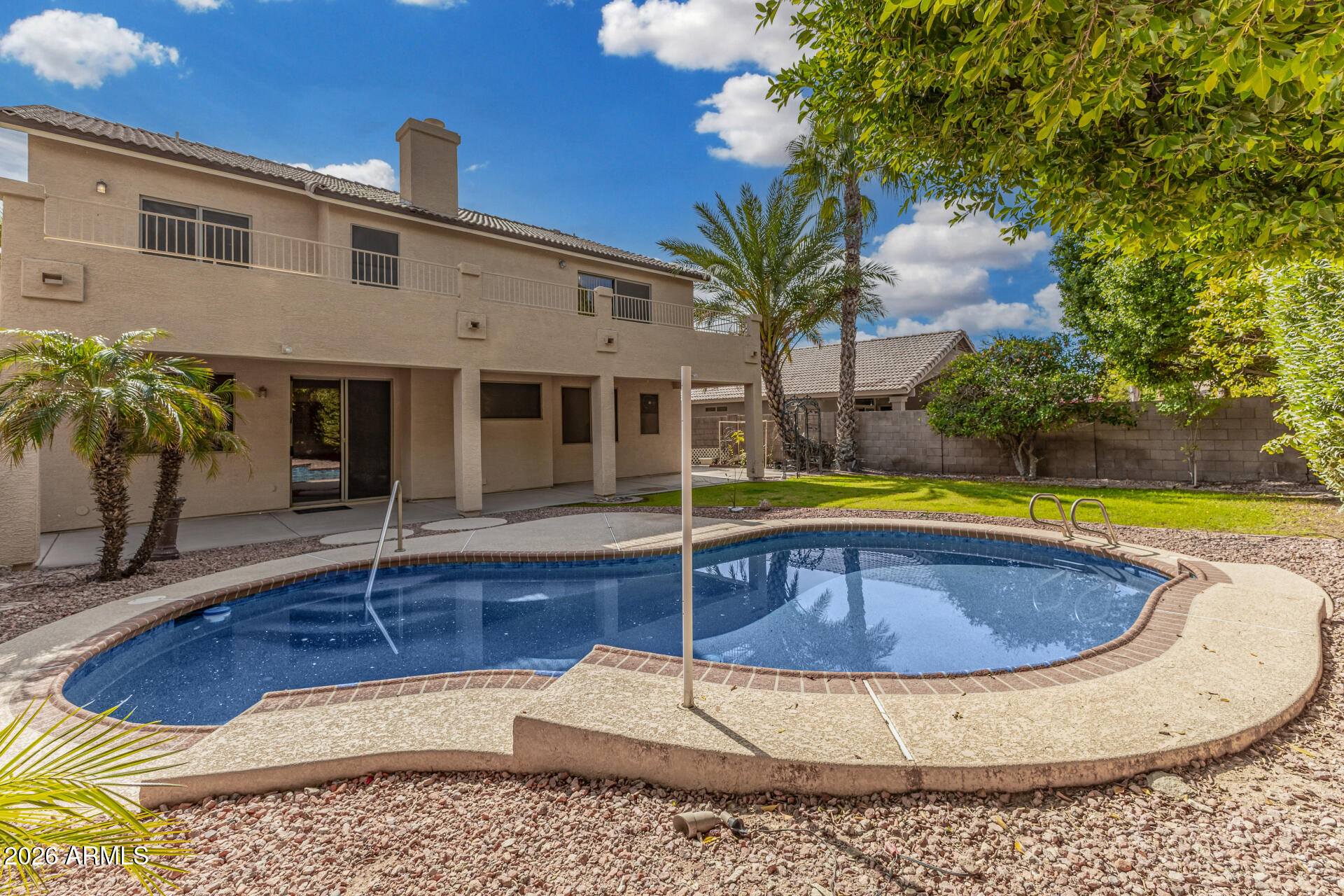 3962 East Agave Road Phoenix, AZ 85044 - Photo 40 of 54 a view of a house with swimming pool