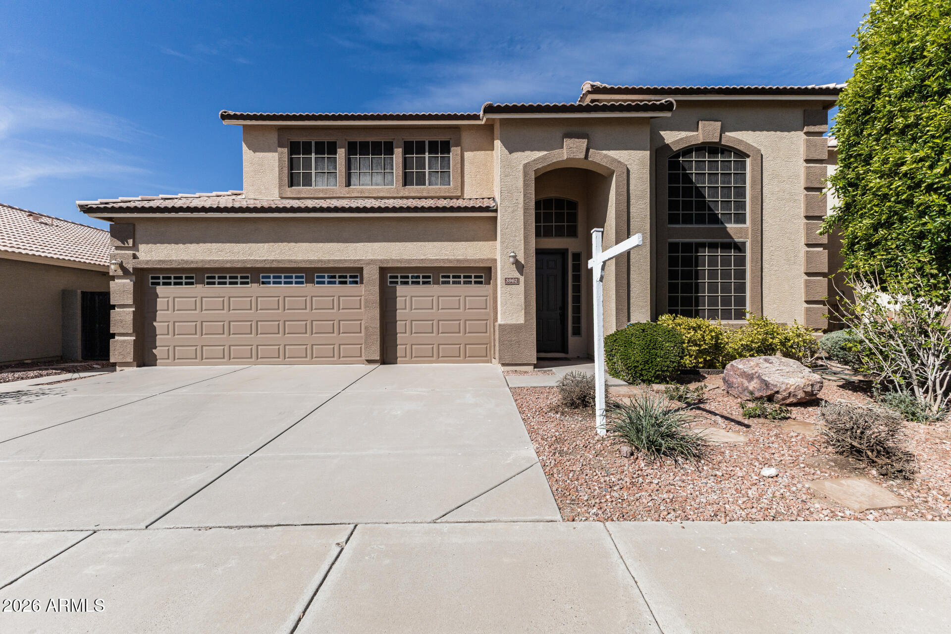 3962 East Agave Road Phoenix, AZ 85044 - Photo 51 of 54 a front view of a house with a yard