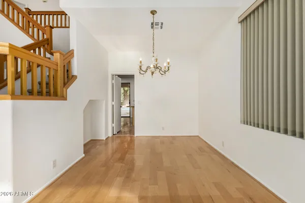 a view of kitchen with stainless steel appliances kitchen island sink refrigerator and stove