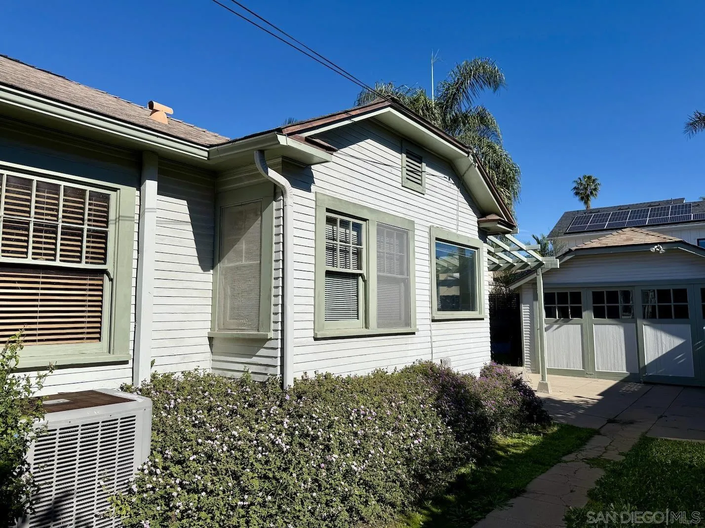 3917 Hawk Street San Diego, CA 92103 - Photo 39 of 40 a front view of a house with a yard