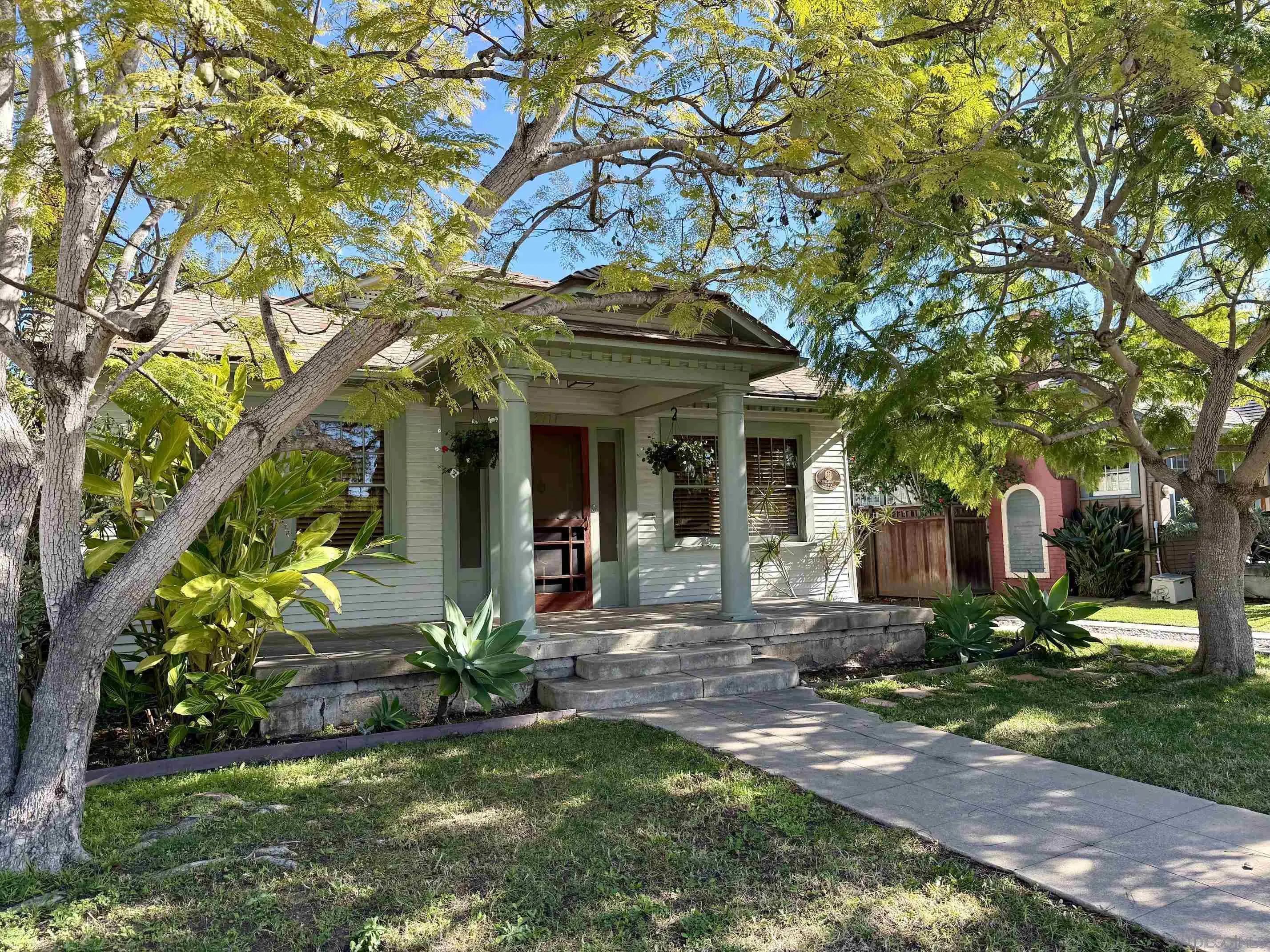 3917 Hawk Street San Diego, CA 92103 - Photo 40 of 40 a view of a house with a tree in front of it