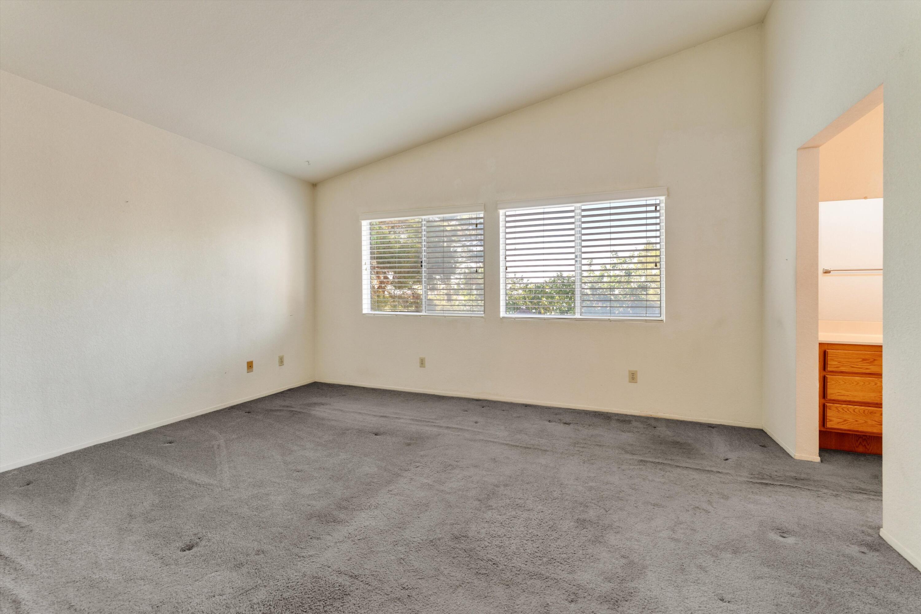 3229 Quarry Road Palmdale, CA 93550 - Photo 22 of 32 an empty room with windows