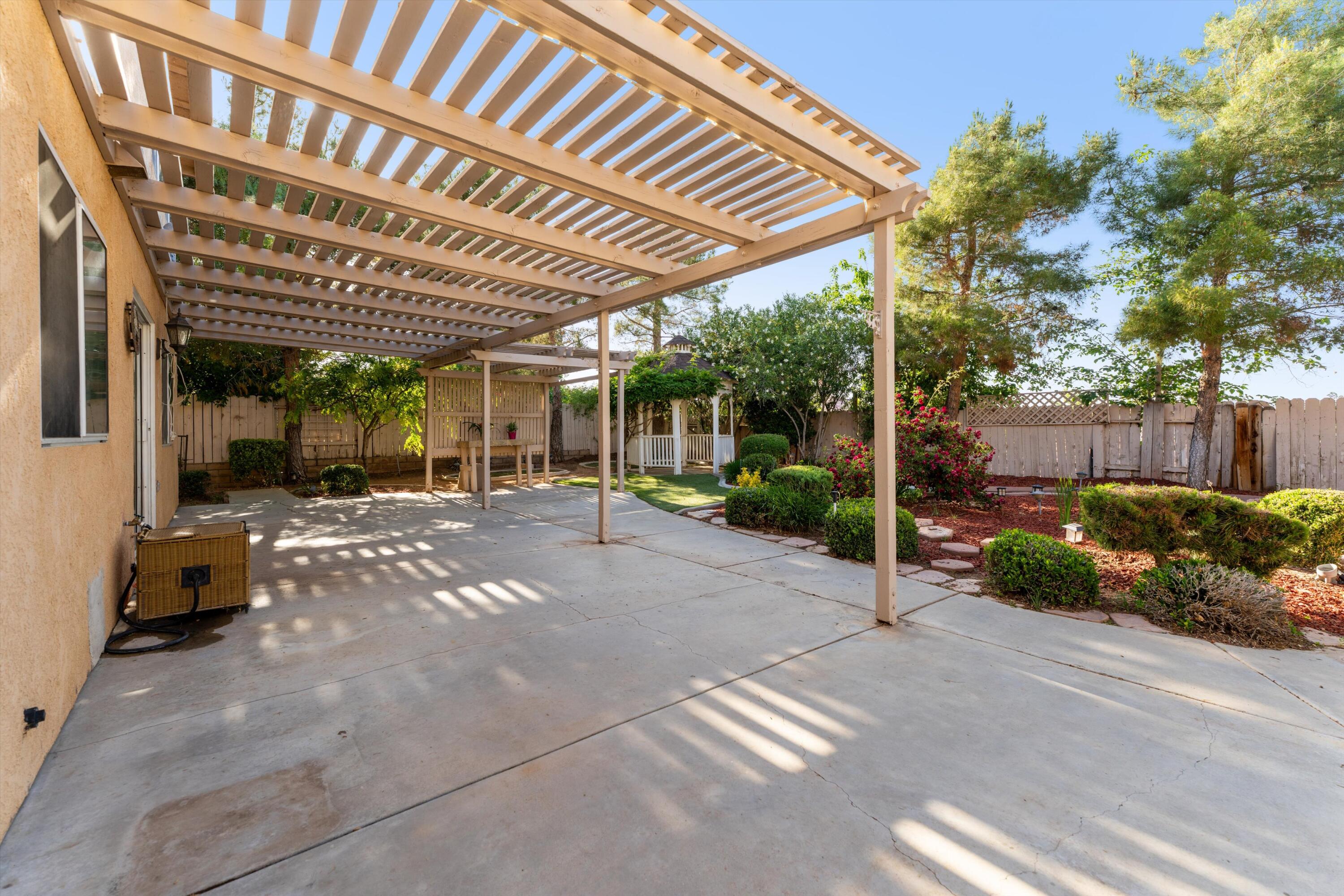 3229 Quarry Road Palmdale, CA 93550 - Photo 3 of 32 a view of a porch with a patio