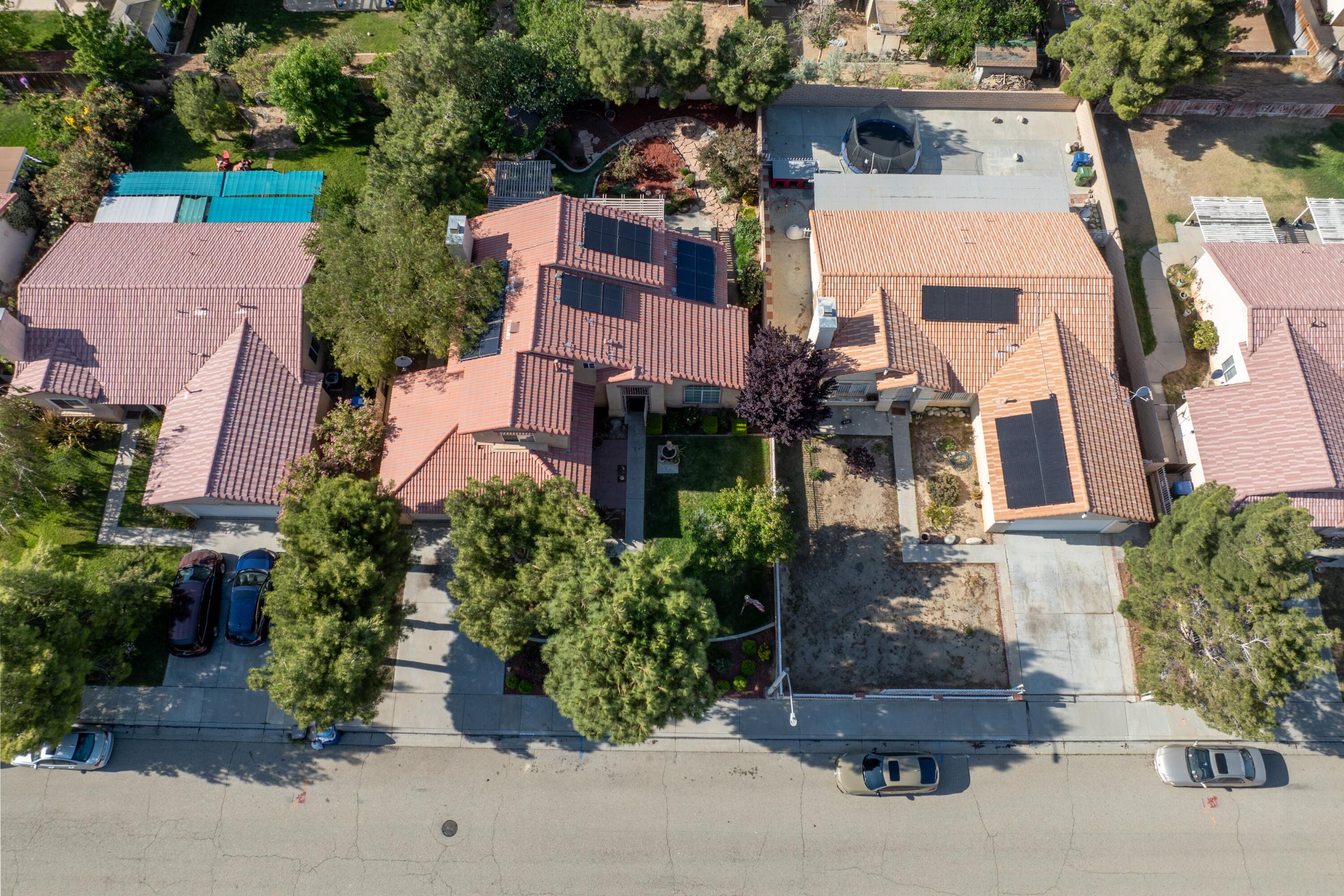 3229 Quarry Road Palmdale, CA 93550 - Photo 7 of 32 an aerial view of a house with a garden