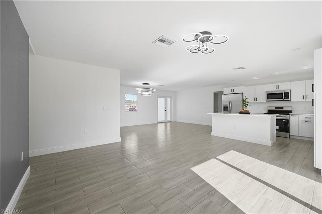 4448 18th Avenue Southwest Naples, FL 34116 - Photo 4 of 28 a view of a living room