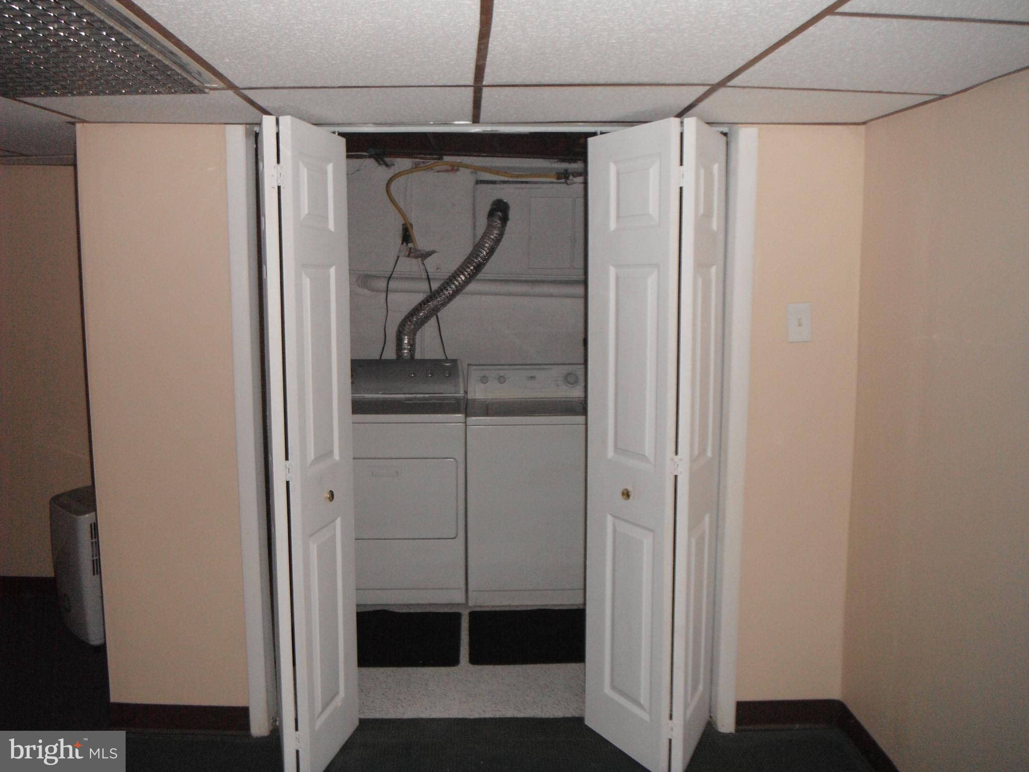 616 Croyden Road Cheltenham, PA 19012 - Photo 25 of 27 Laundry in basement closet off family room.
