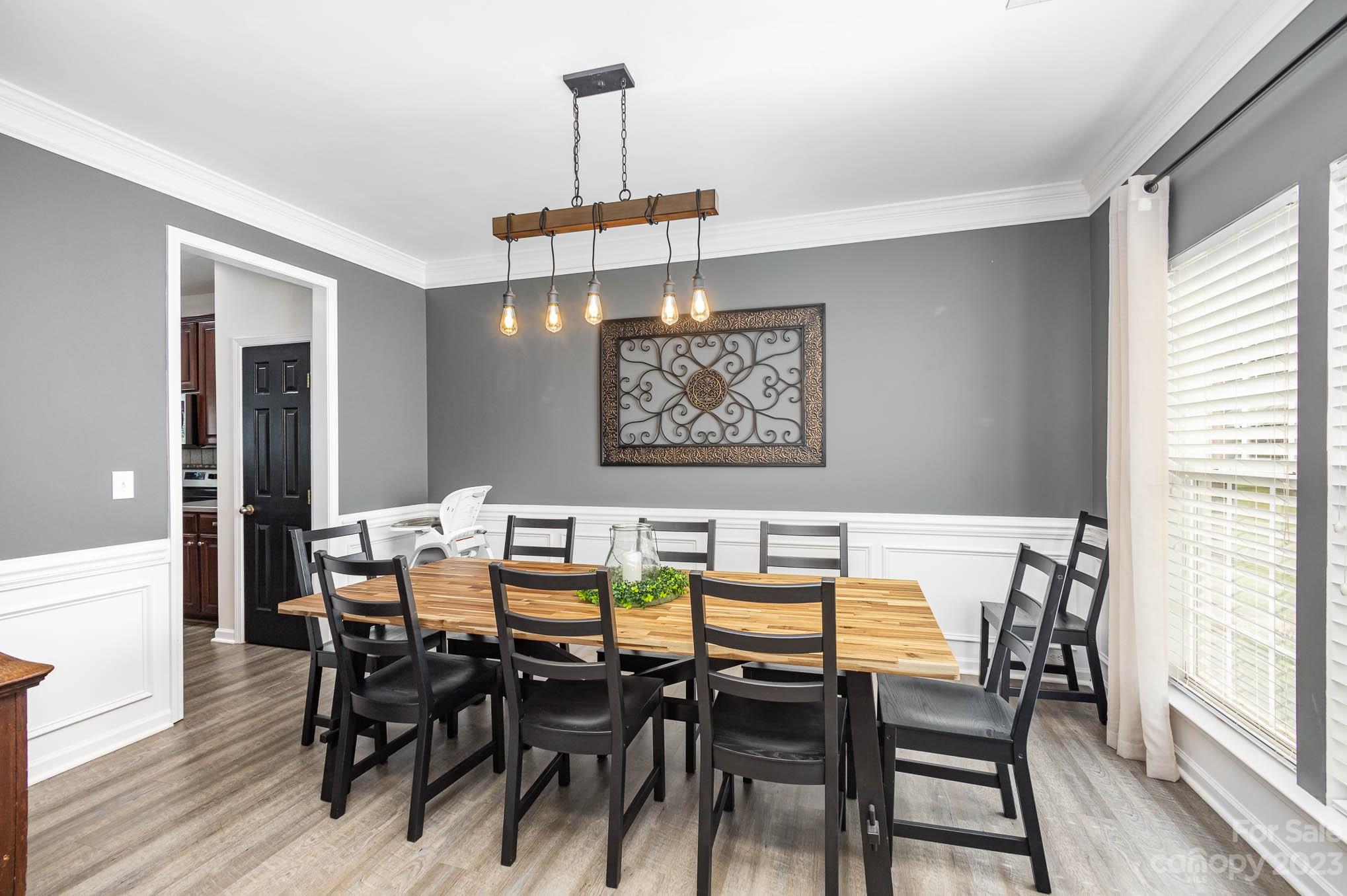 2379 Smith Cove Road Denver, NC 28037 - Photo 13 of 40 a view of a dining room with furniture window and wooden floor