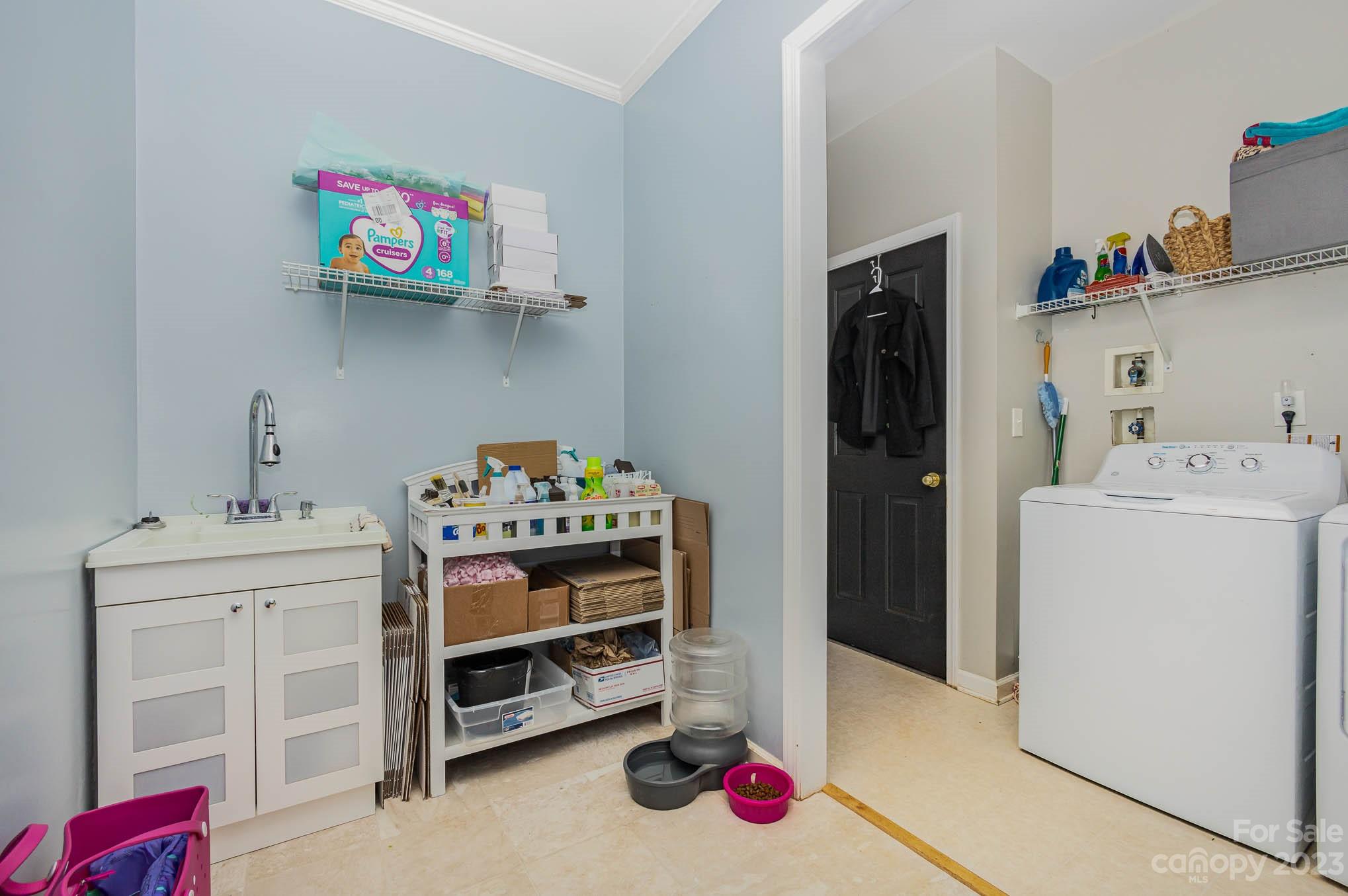 2379 Smith Cove Road Denver, NC 28037 - Photo 17 of 40 a utility room with dryer and washer