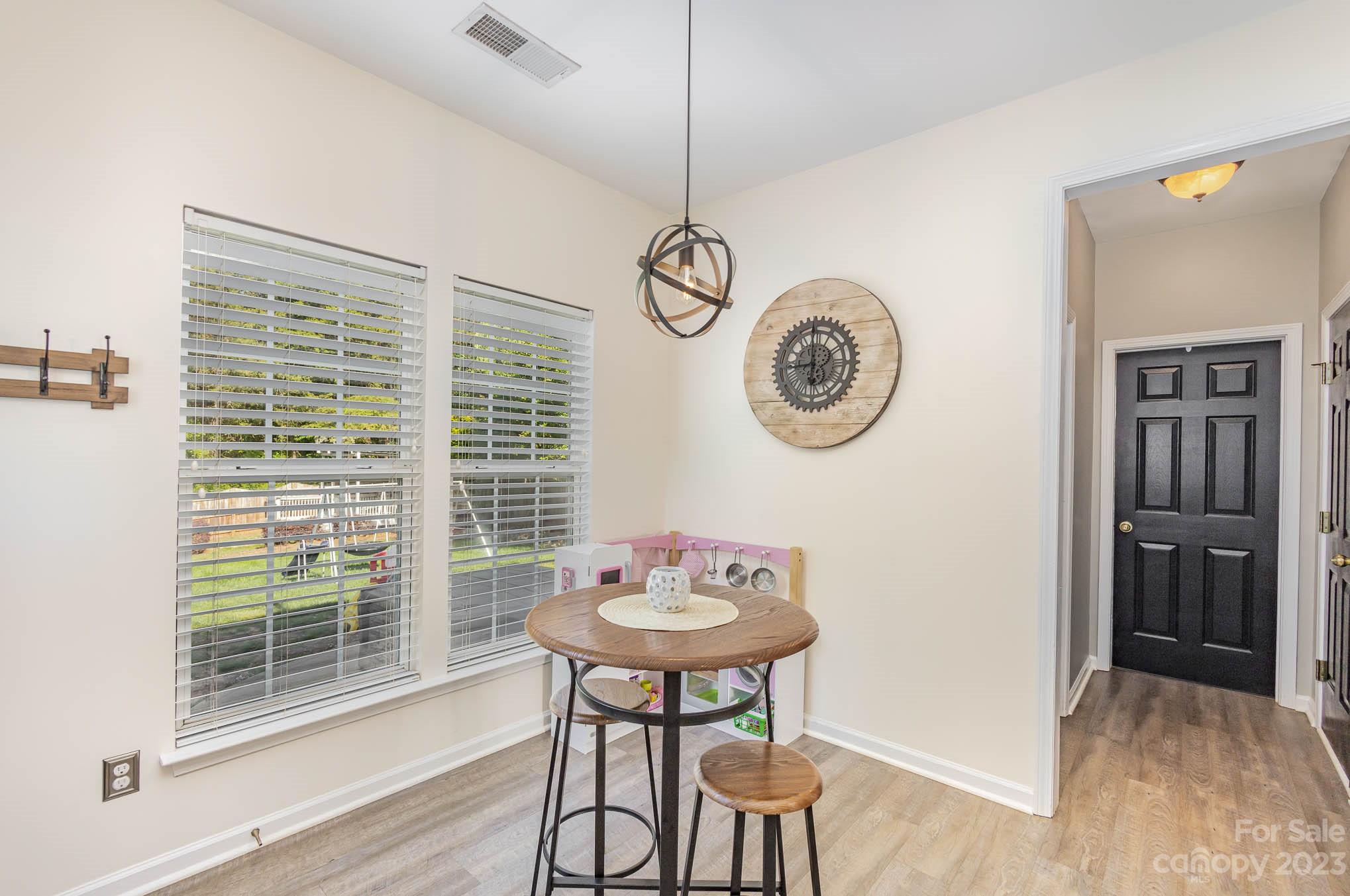 2379 Smith Cove Road Denver, NC 28037 - Photo 3 of 40 a view of a room that has a table and a chair
