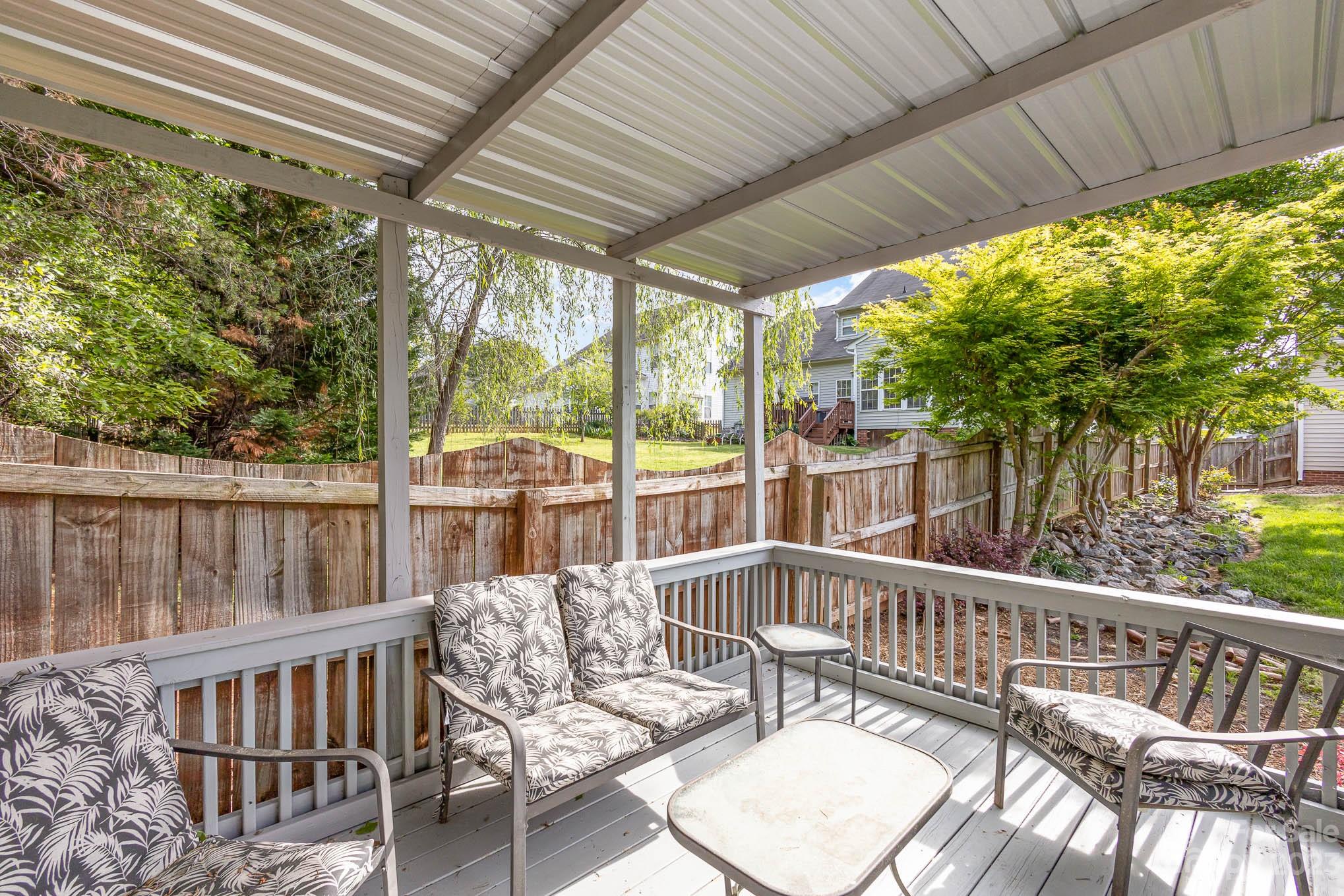 2379 Smith Cove Road Denver, NC 28037 - Photo 36 of 40 a view of a chair and table in the balcony
