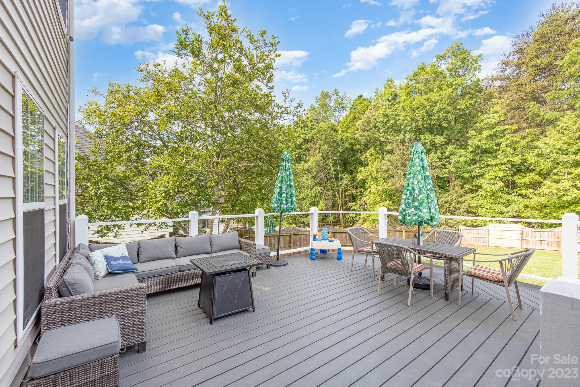 2379 Smith Cove Road Denver, NC 28037 - Photo 37 of 40 a balcony with furniture and wooden floor