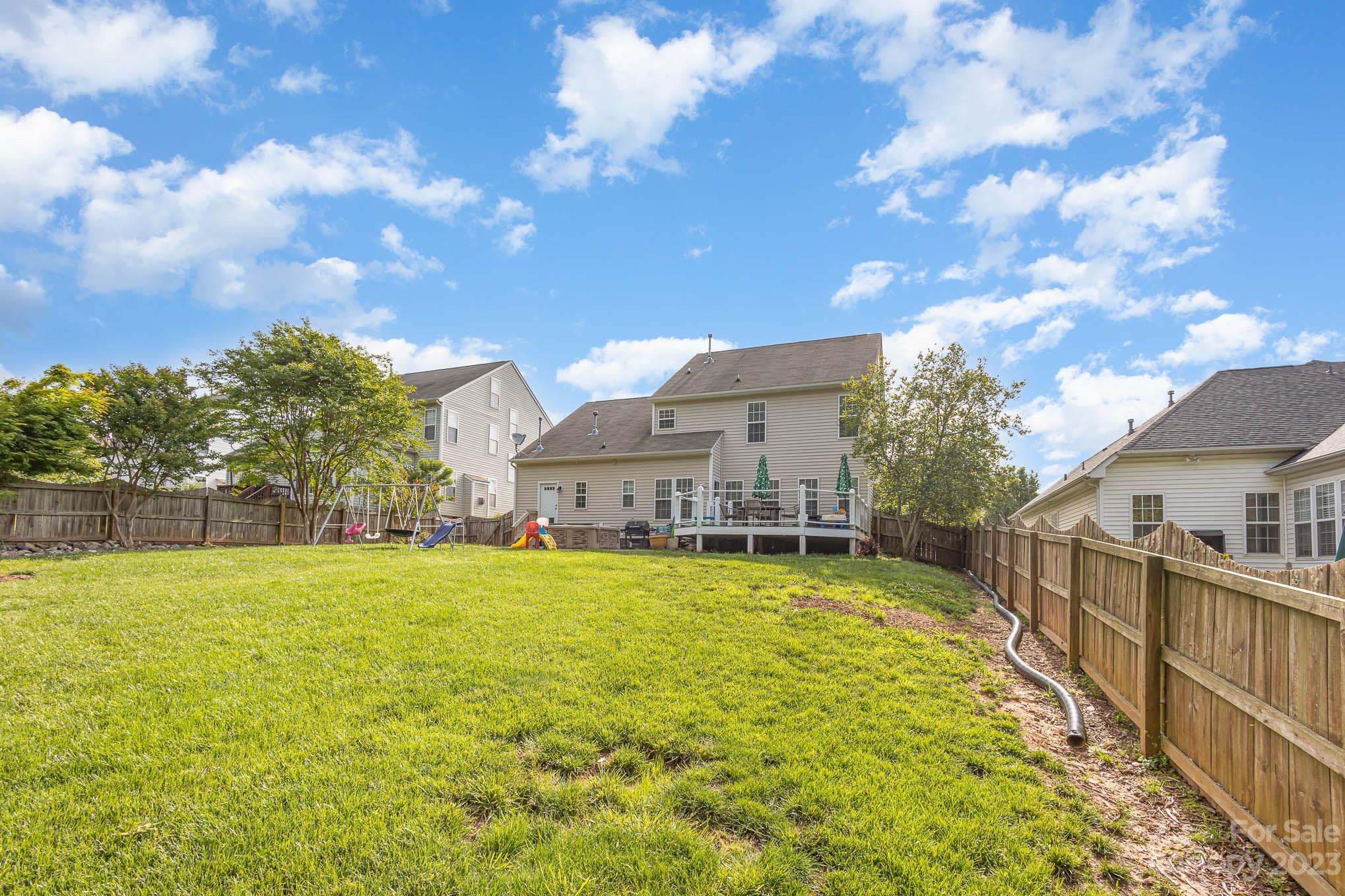 2379 Smith Cove Road Denver, NC 28037 - Photo 39 of 40 a view of a house with a big yard