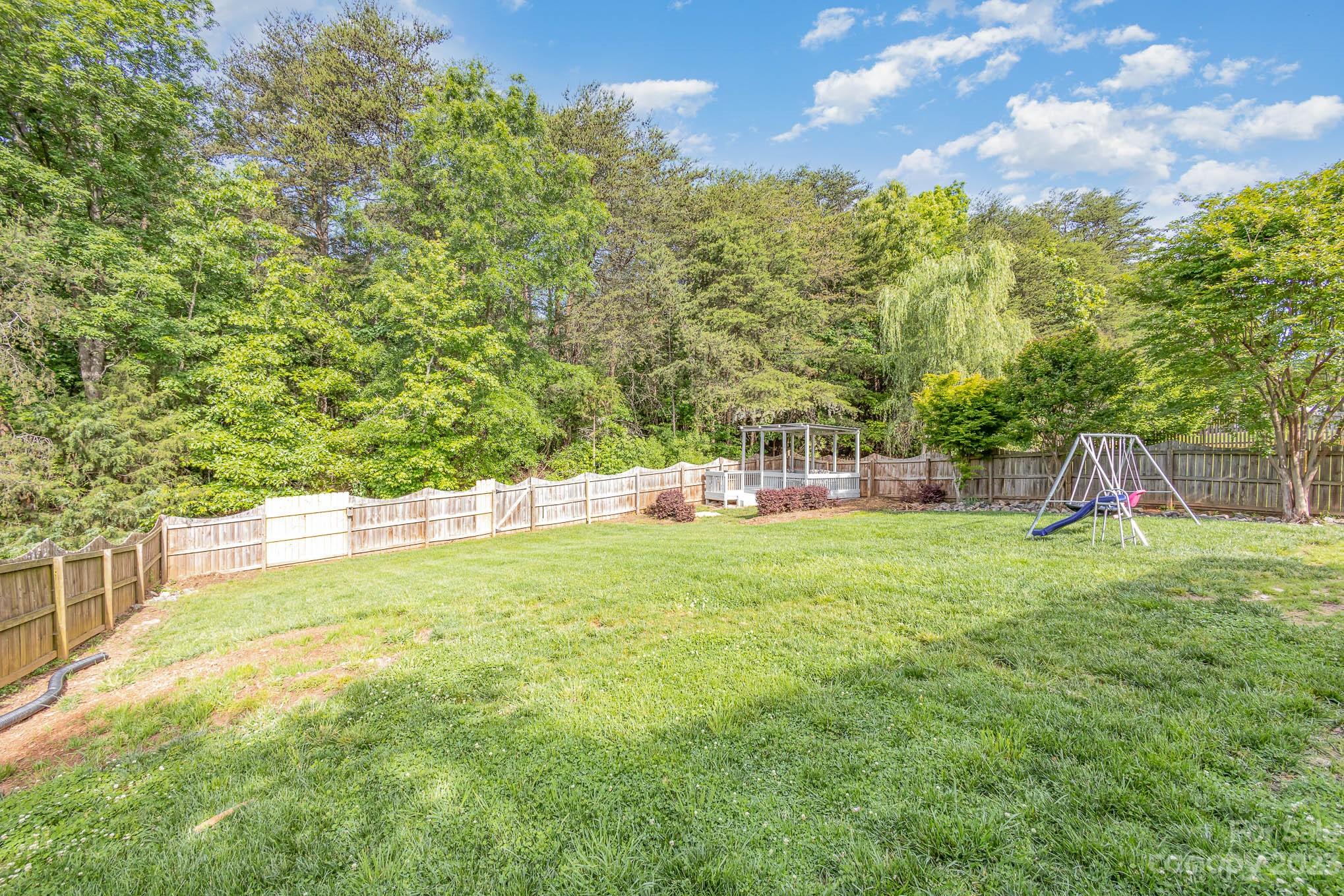 2379 Smith Cove Road Denver, NC 28037 - Photo 40 of 40 a view of a field with sitting area