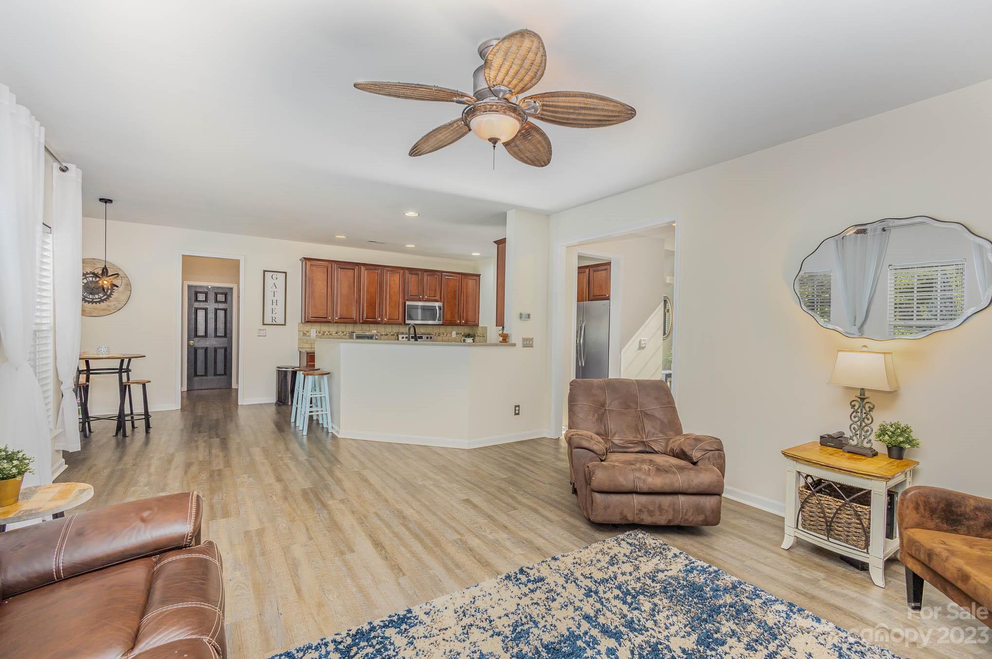 2379 Smith Cove Road Denver, NC 28037 - Photo 7 of 40 a living room with furniture and kitchen view