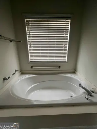 a bathroom with a bathtub