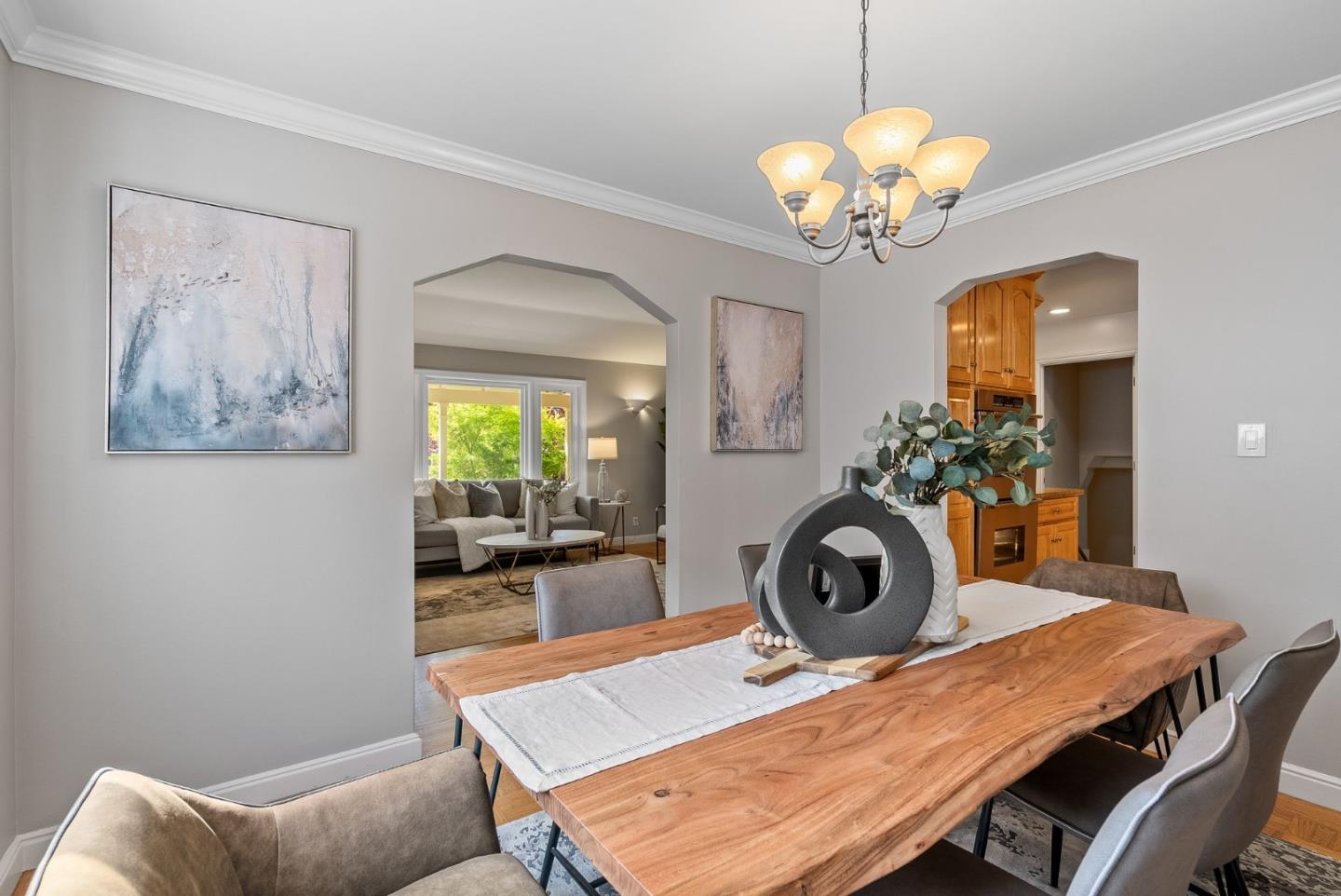 1127 Eastmoor Road Burlingame, CA 94010 - Photo 12 of 58 a view of a dining room with furniture and wooden floor