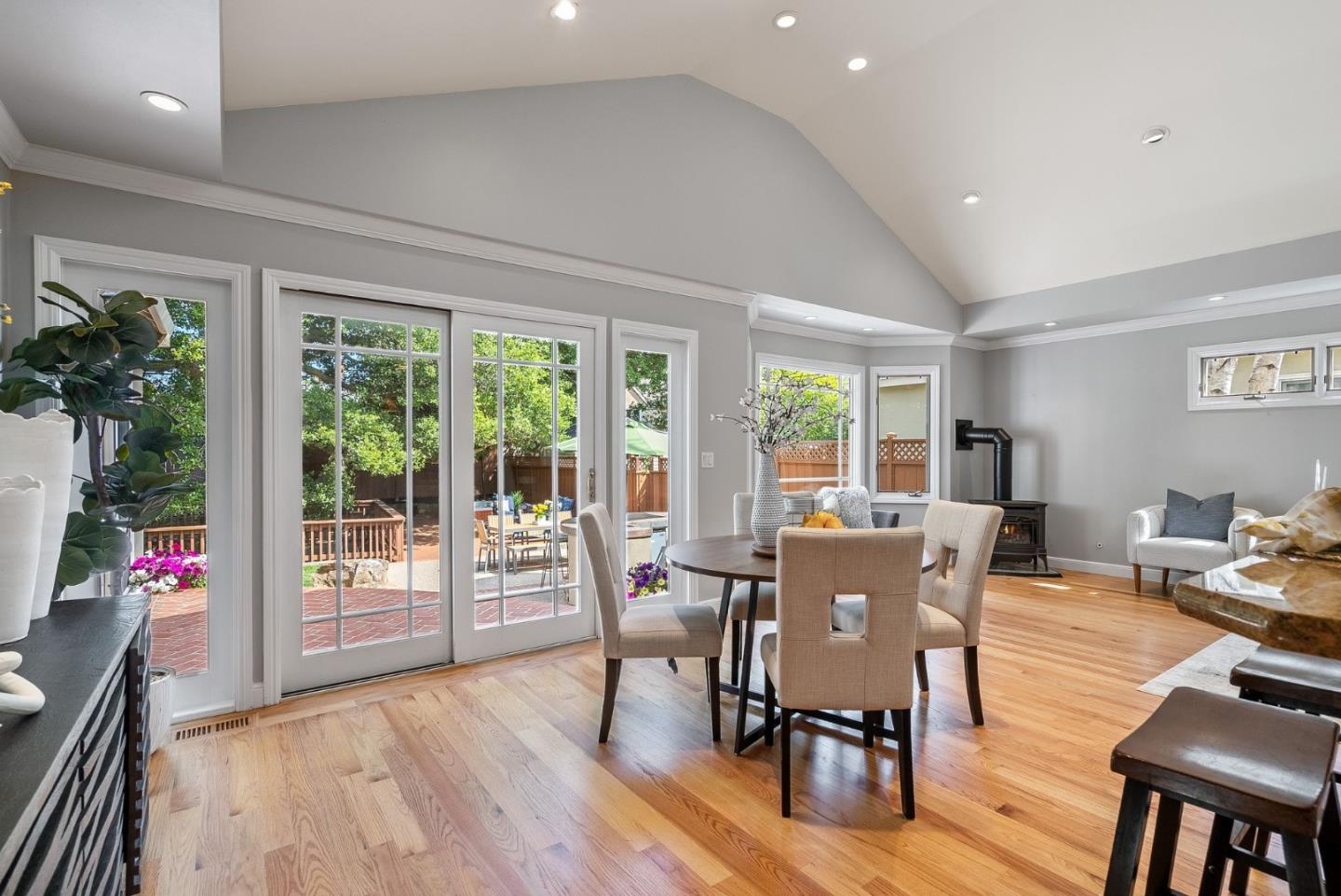 1127 Eastmoor Road Burlingame, CA 94010 - Photo 17 of 58 a view of a dining room with furniture window and wooden floor