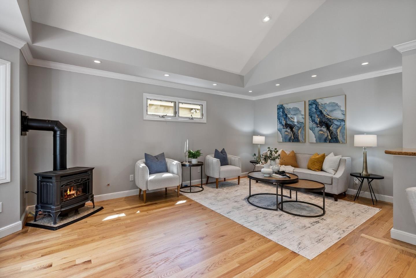 1127 Eastmoor Road Burlingame, CA 94010 - Photo 19 of 58 a living room with furniture and a wooden floor