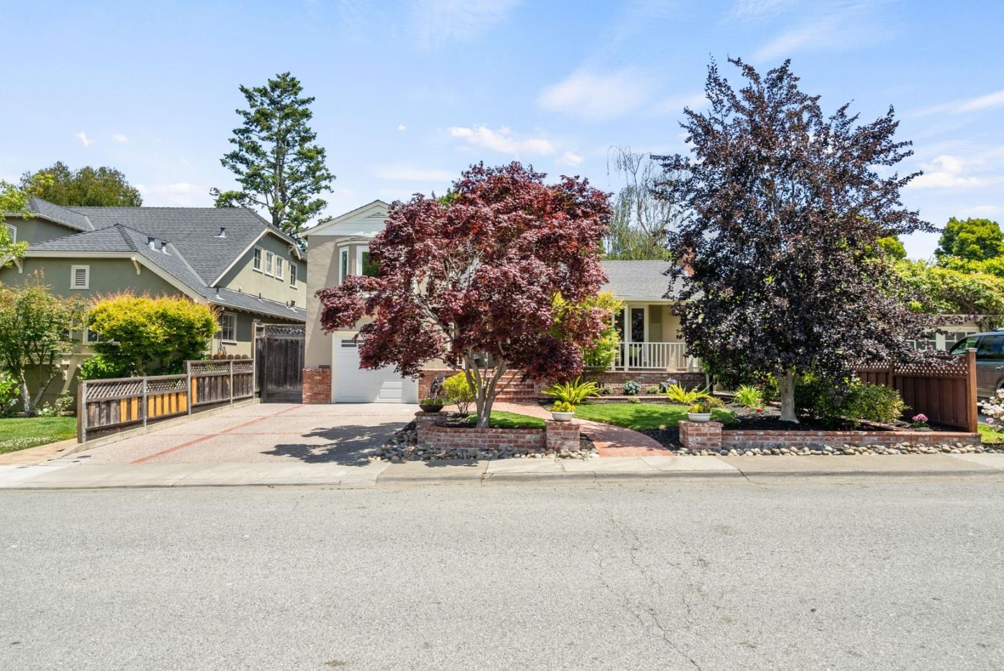 1127 Eastmoor Road Burlingame, CA 94010 - Photo 2 of 58 a view of a house with palm trees