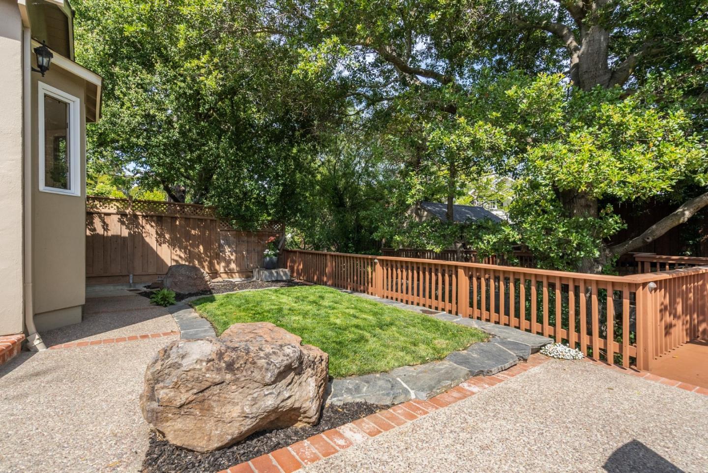 1127 Eastmoor Road Burlingame, CA 94010 - Photo 25 of 58 a view of a backyard with a garden
