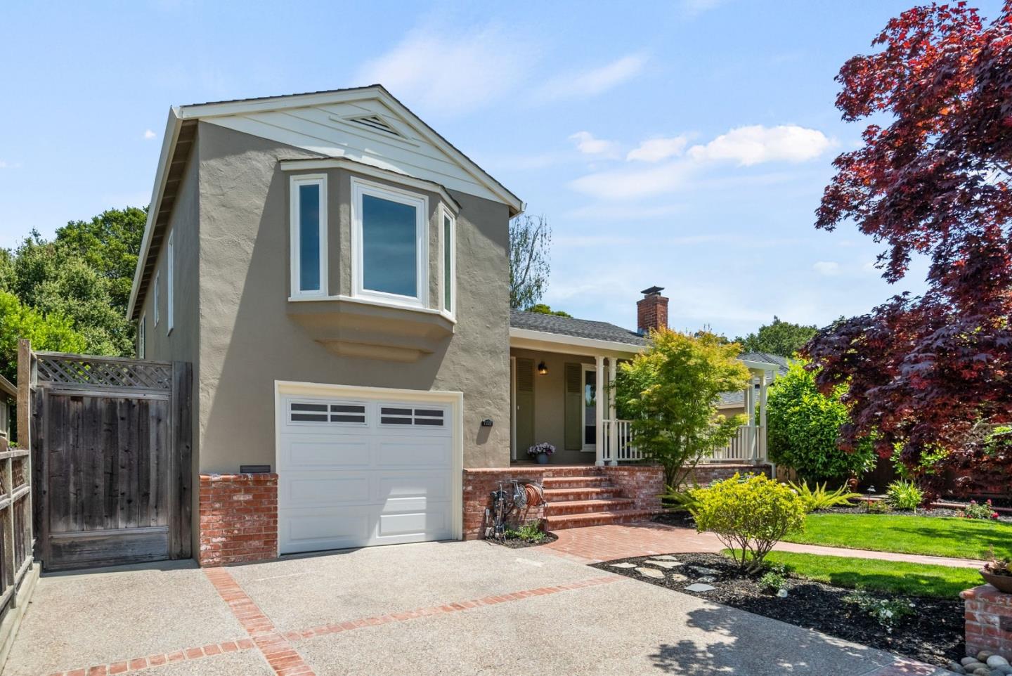 1127 Eastmoor Road Burlingame, CA 94010 - Photo 3 of 58 a front view of a house with garden
