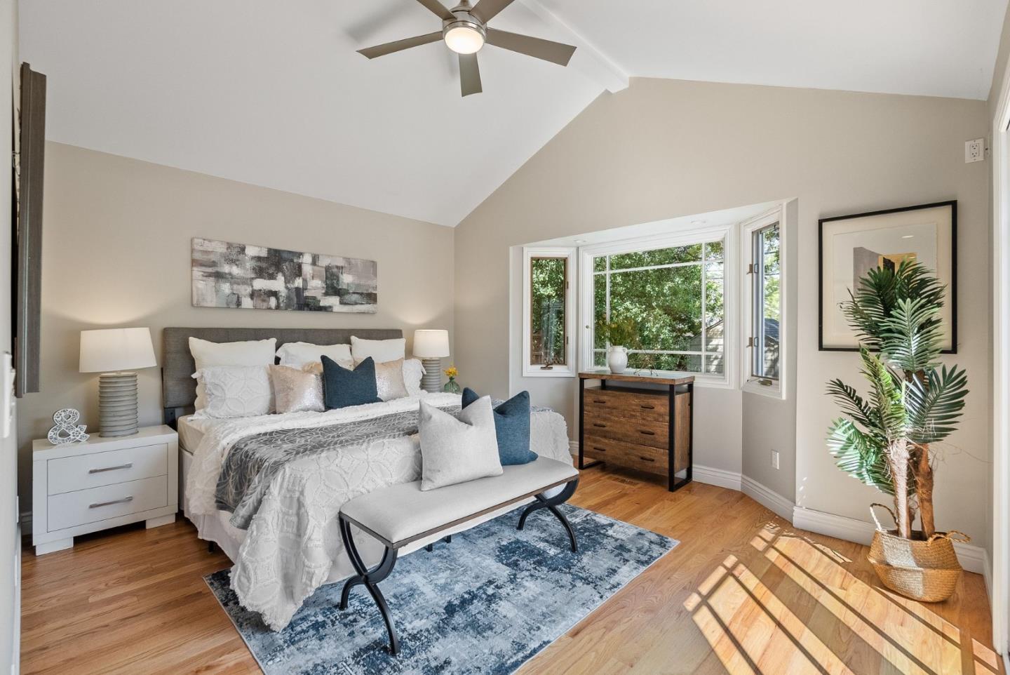1127 Eastmoor Road Burlingame, CA 94010 - Photo 34 of 58 a bedroom with a large bed and a window