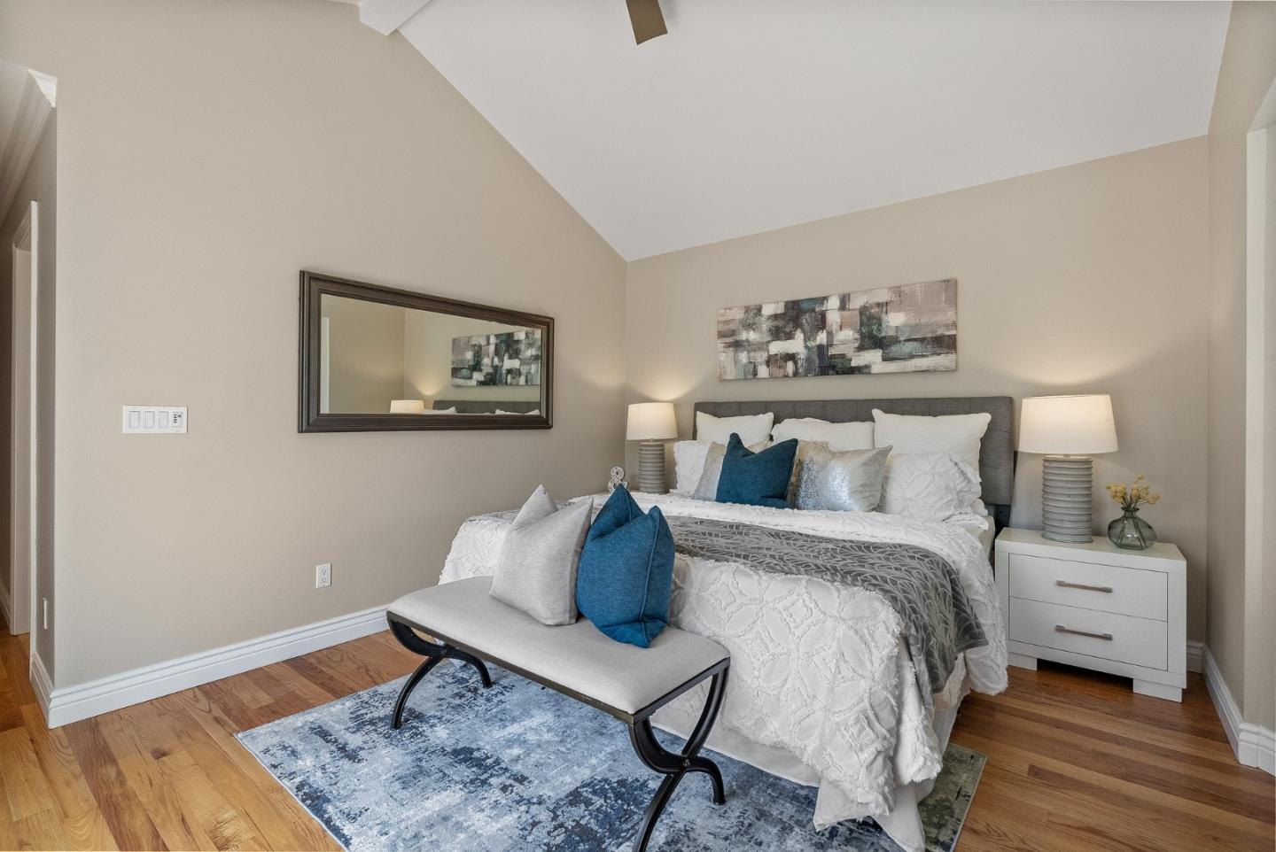 1127 Eastmoor Road Burlingame, CA 94010 - Photo 35 of 58 a bedroom with a bed and wooden floor
