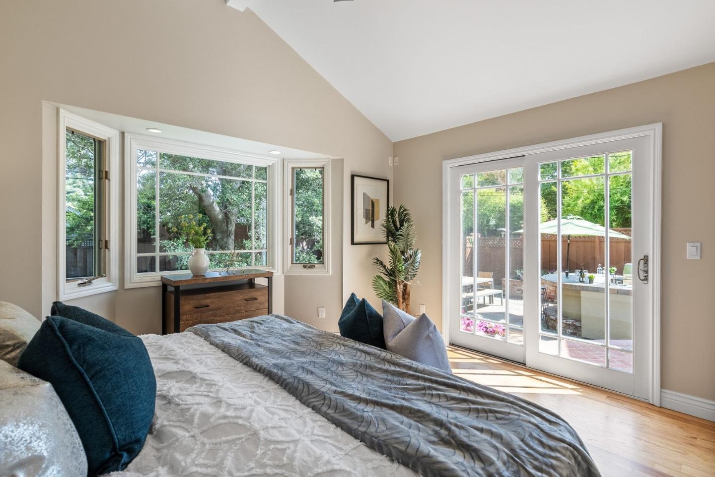 1127 Eastmoor Road Burlingame, CA 94010 - Photo 36 of 58 a bedroom with a large bed and a large window