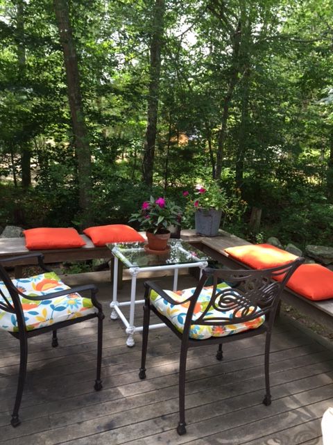 33R N Road Chilmark, MA 02535 - Photo 21 of 31 a patio with table and chairs