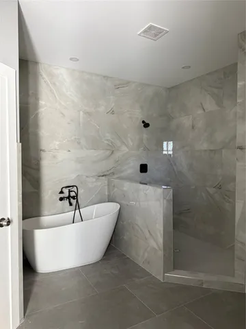 a bathroom with a bathtub
