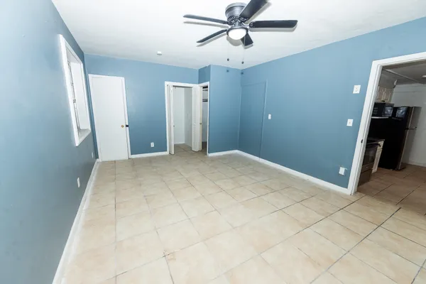 a view of a hallway with closet