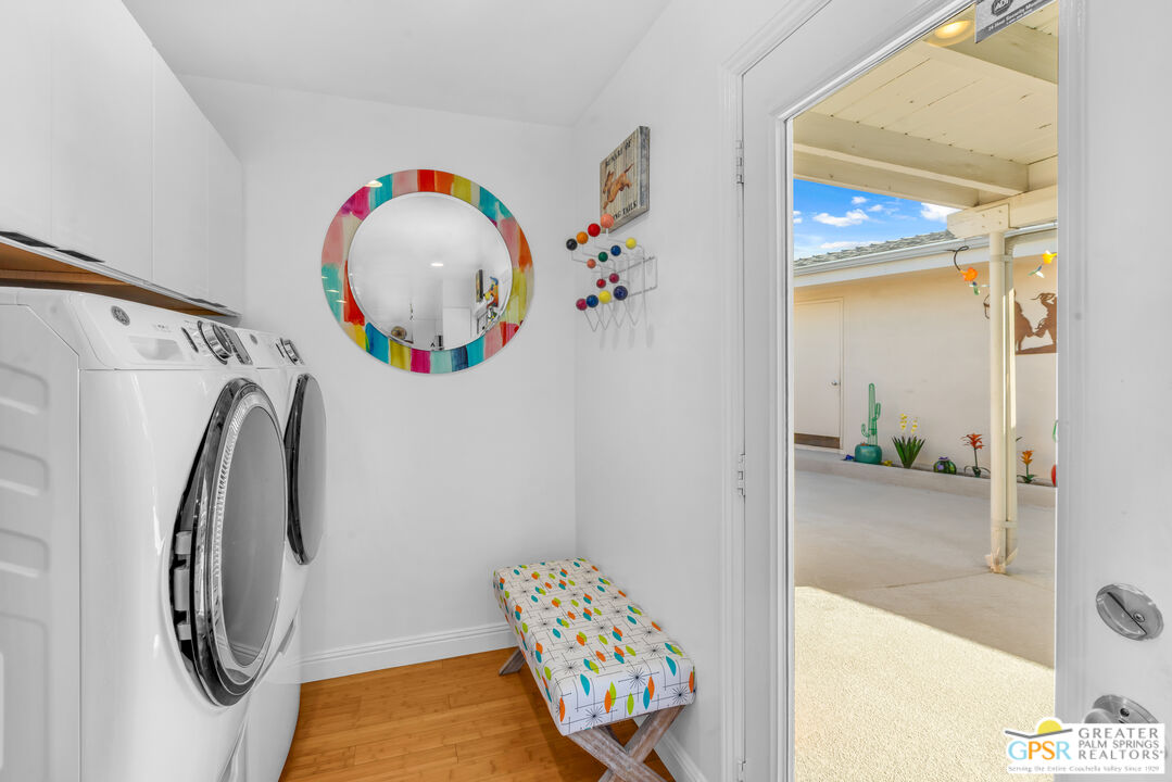 68401 Rodeo Road Cathedral City, CA 92234 - Photo 15 of 46 a bathroom with a mirror and a shower