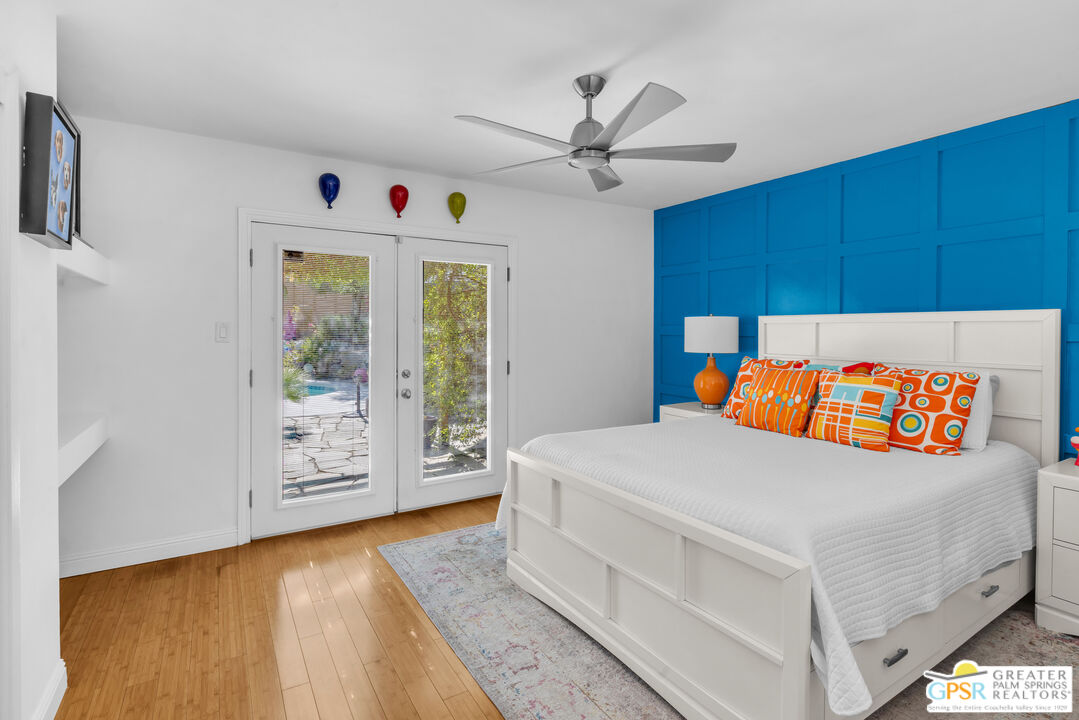 68401 Rodeo Road Cathedral City, CA 92234 - Photo 17 of 46 a bedroom with a bed and a dresser