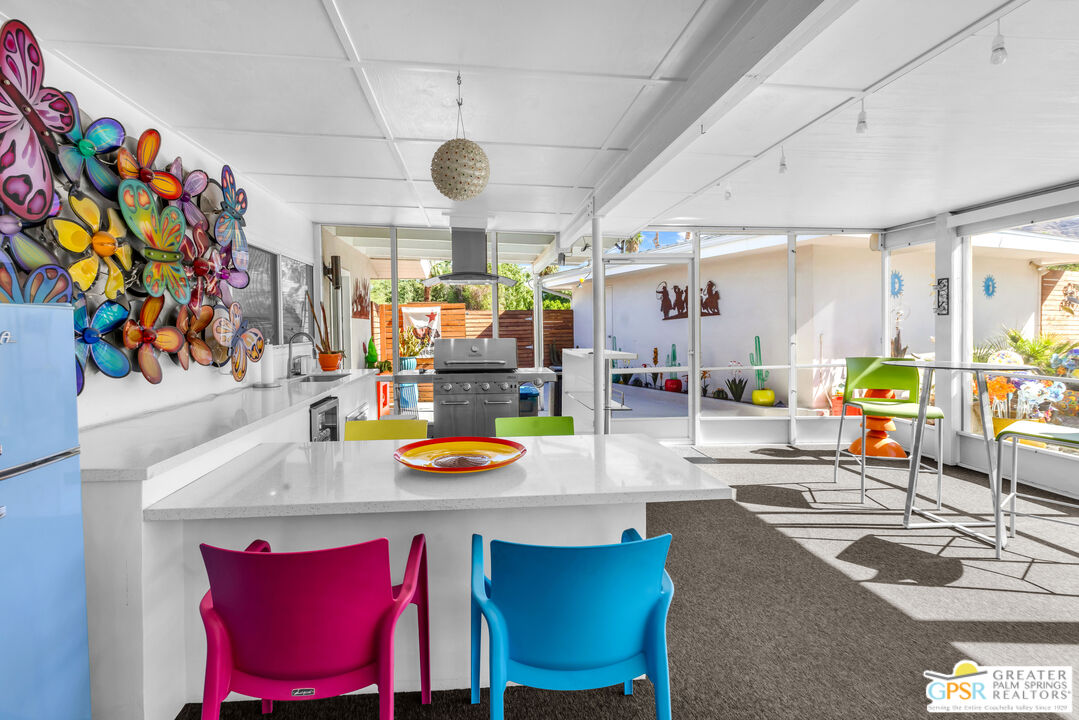 68401 Rodeo Road Cathedral City, CA 92234 - Photo 29 of 46 a view of a dining room with furniture