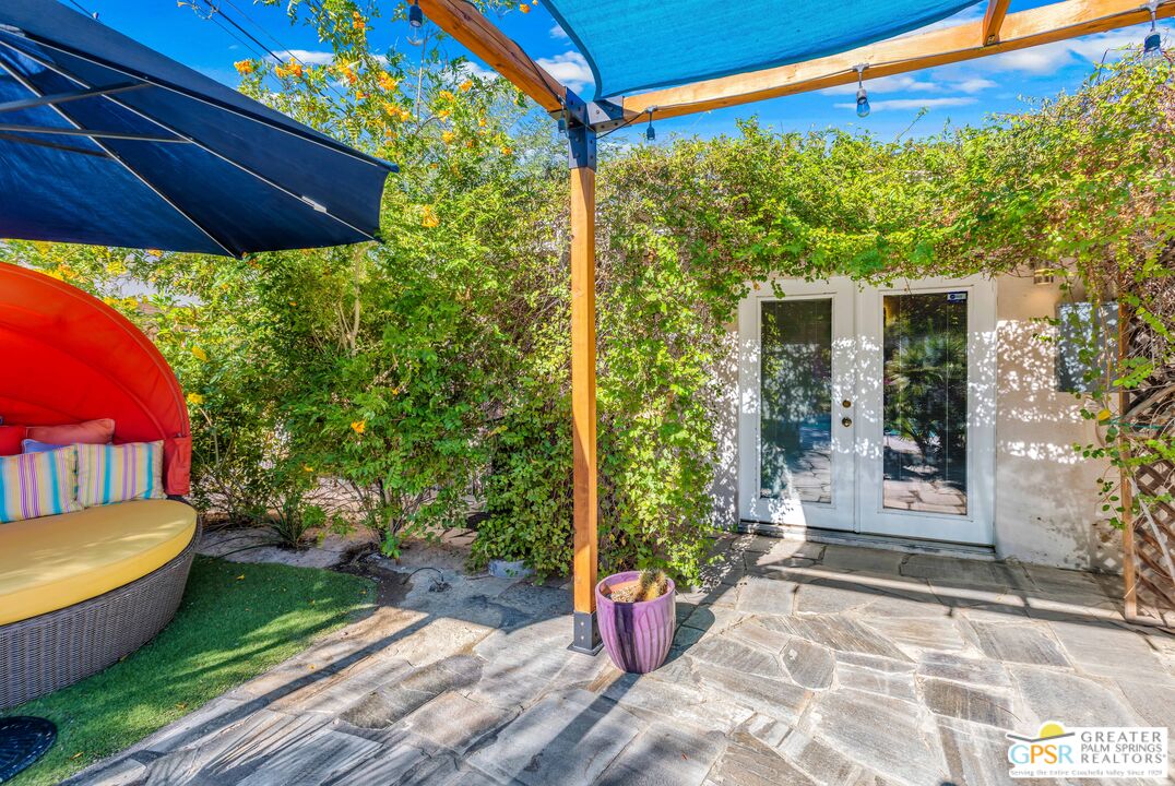 68401 Rodeo Road Cathedral City, CA 92234 - Photo 38 of 46 a view of a backyard with potted plants