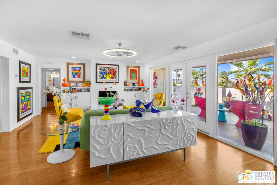 68401 Rodeo Road Cathedral City, CA 92234 - Photo 9 of 46 a living room with furniture and a flat screen tv
