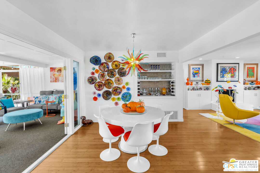 68401 Rodeo Road Cathedral City, CA 92234 - Photo 10 of 46 a living room with furniture and a dining table