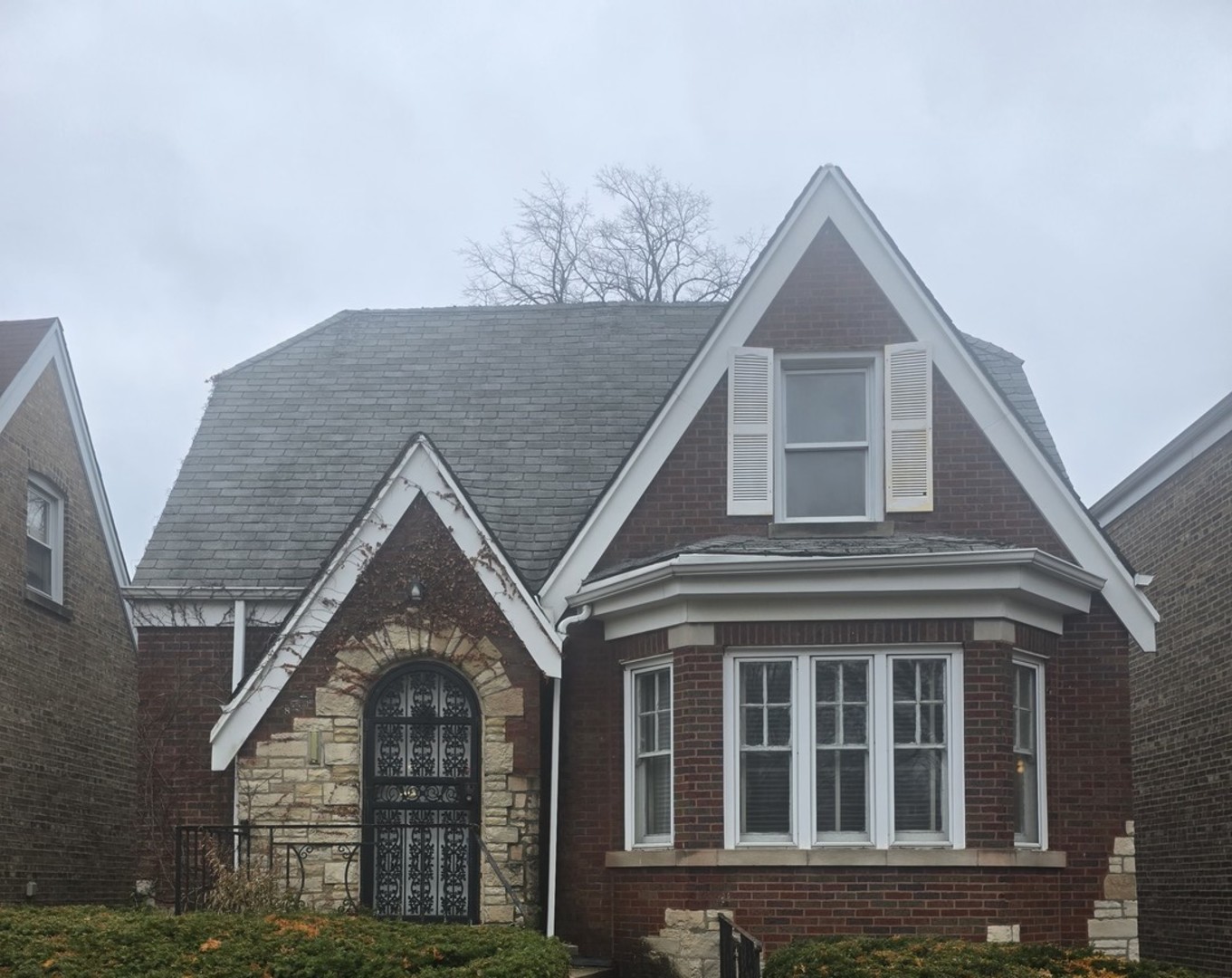8411 South Indiana Avenue Chicago, IL 60619 - Photo 3 of 7 a front view of a house