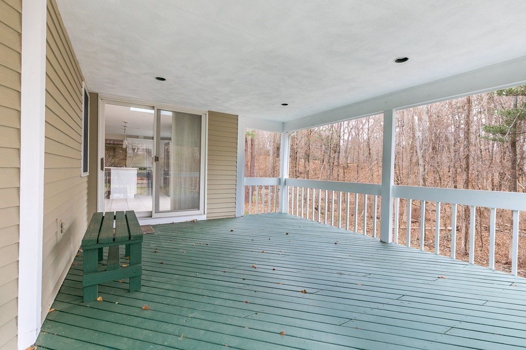 1 Sutton Place Weston, MA 02493 - Photo 33 of 33 a view of an empty room with wooden floor and a window