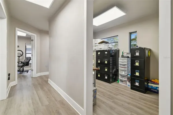 a room with furniture and wooden floor