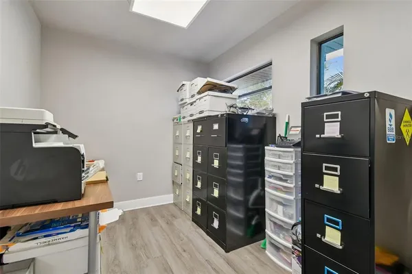 a kitchen with a stove and a refrigerator