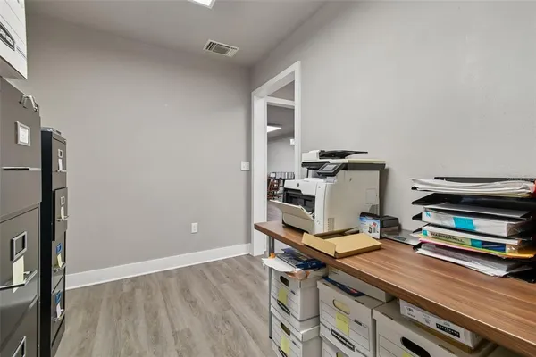 a bathroom with a toilet and a sink