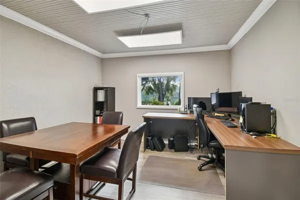 a view of a workspace with furniture