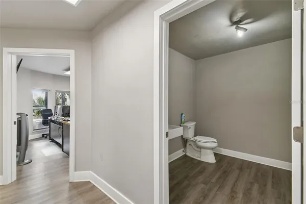 a room with furniture and a flat screen tv