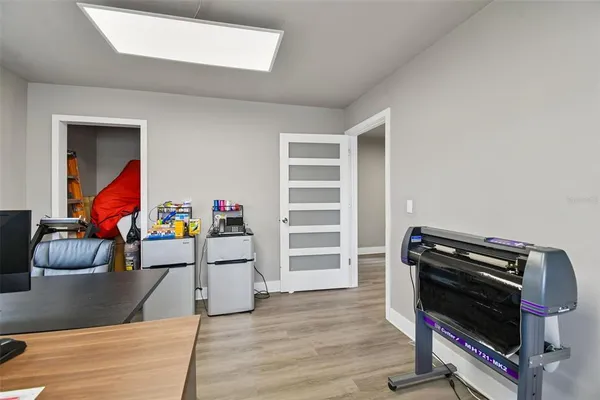 a room with furniture and wooden floor