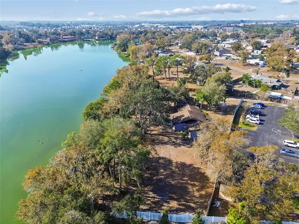 a view of swimming pool with a yard